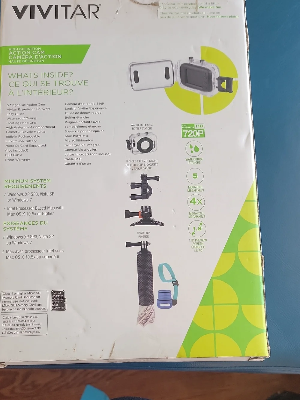 Silver Action Camera with Blue-Accented Floating Hand Grip